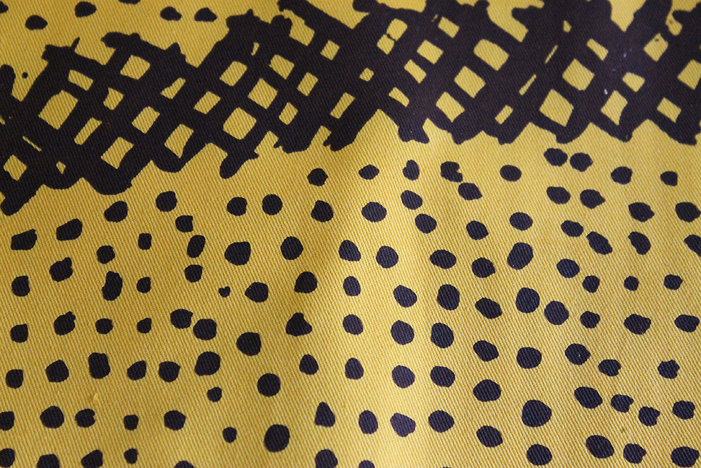 Jilamara Heavy Cotton Fabric - Brown on Yellow